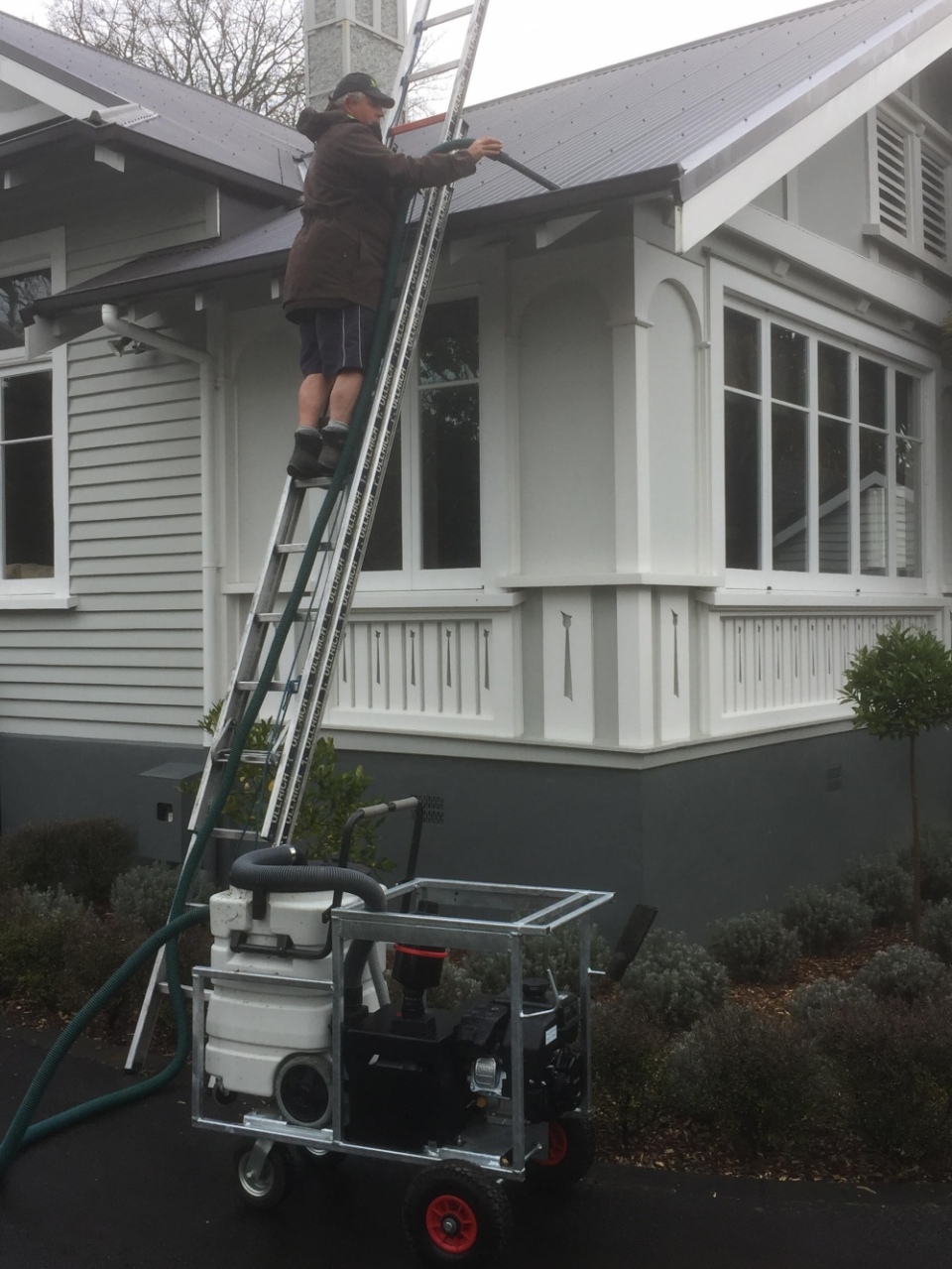 Photo of gutter cleaning service provided by Ewash.